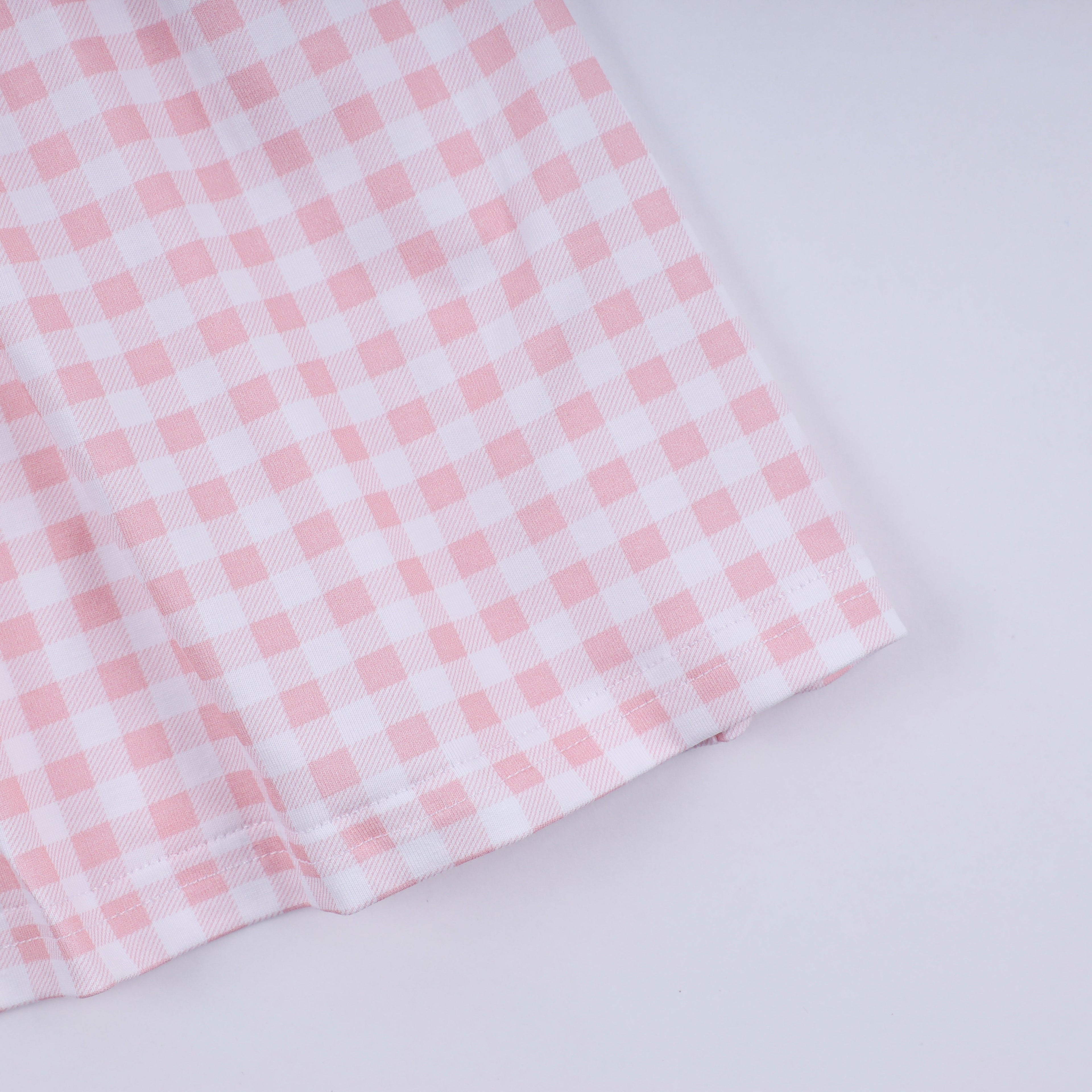 Pink character hand smocked gingham ruffle dress