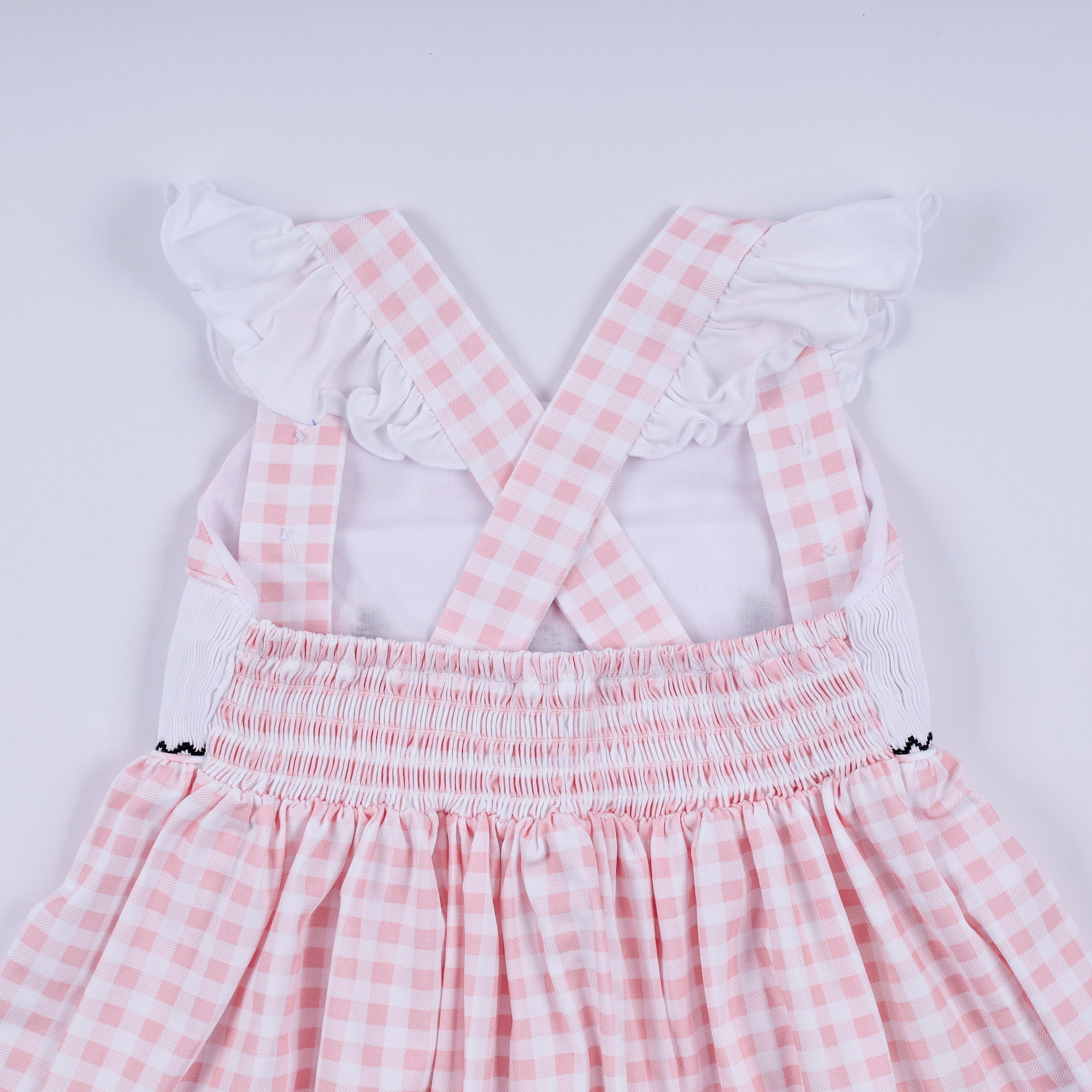 Pink character hand smocked gingham ruffle dress